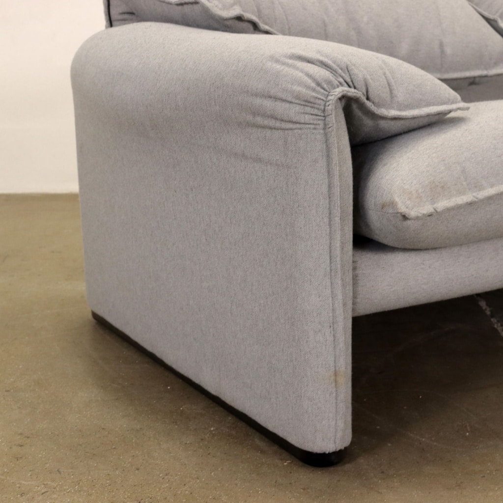 Two-seater sofa, armrest detail.